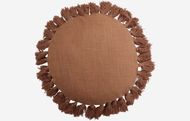 Round cushion in brown